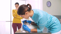 Female vet examining a cat at the veterinary clinic - PhotoDune Item for Sale