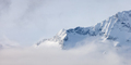 Tantalus Range covered in Snow and Clouds during Winter Season. - PhotoDune Item for Sale