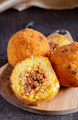 Fried stuffed Sicilian arancini with breadcrumbs crust - PhotoDune Item for Sale