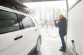 Man washing high pressure water american SUV car  - PhotoDune Item for Sale