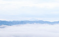 Sea of clouds with mountains in the background. - PhotoDune Item for Sale