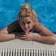Blonde Girl Relaxing Near The Pool - VideoHive Item for Sale