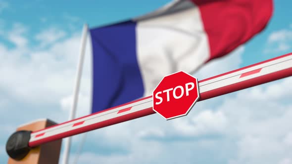 Barrier Gate Being Opened with Flag of France As a Background