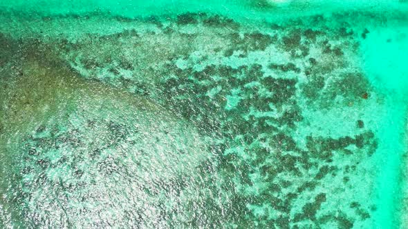 Aerial top view seascape of perfect resort beach vacation by aqua blue water and clean sandy backgro