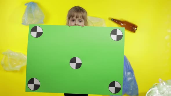 Girl Activist Holding Chroma Key Poster with Tracking Points. Environment Trash Plastic Pollution