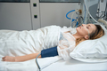 Pretty lady lies in intensive care in clinic - PhotoDune Item for Sale
