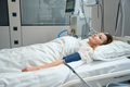 Pretty woman lies in intensive care in hospital - PhotoDune Item for Sale
