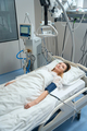 Pretty lady recovering in intensive care in hospital - PhotoDune Item for Sale