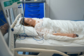 Woman recovering in intensive care in hospital - PhotoDune Item for Sale