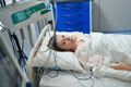 Female recovering in intensive care in hospital - PhotoDune Item for Sale