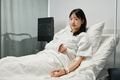 Young Asian Patient In Hospital Bed - PhotoDune Item for Sale