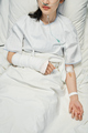 Young Woman In Hospital Bed - PhotoDune Item for Sale