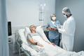 Medical Specialists Working With Mature Man - PhotoDune Item for Sale