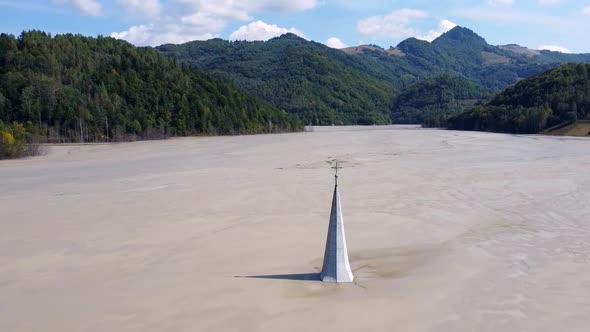 Flooded Church By Mining Residuals In Geamana, Romania, Aerial View