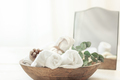 Spa composition with soap, bath bomb and towels in a wooden bowl. - PhotoDune Item for Sale