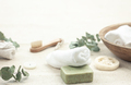 Spa composition with soap, brushes and towels on a blurred background. - PhotoDune Item for Sale
