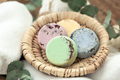 Close-up, colored handmade soap, towel and eucalyptus. - PhotoDune Item for Sale