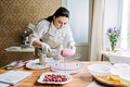 Online classes and workshops on cake decorating and baking. Female Confectioner baker make custom - PhotoDune Item for Sale