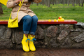Stress resilience and mental health, no depression concept. Womens legs in yellow rubber boots and - PhotoDune Item for Sale