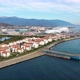 Port in Large City with Park and Red Roof Buildings District - VideoHive Item for Sale
