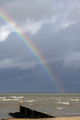 An empty North sea beach with a rainbow in Breskens - PhotoDune Item for Sale