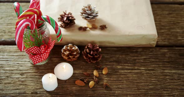 Christmas decorations and gift box on wooden table 4k