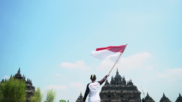 Young Man Holds Flag Of Indonesia