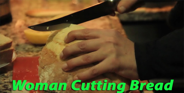 Woman Cutting Bread