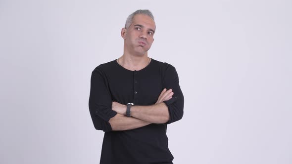 Tired Persian Man Looking Bored Against White Background