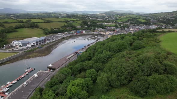 Bantry town in south west County Cork, Ireland reveal over trees aerial drone view