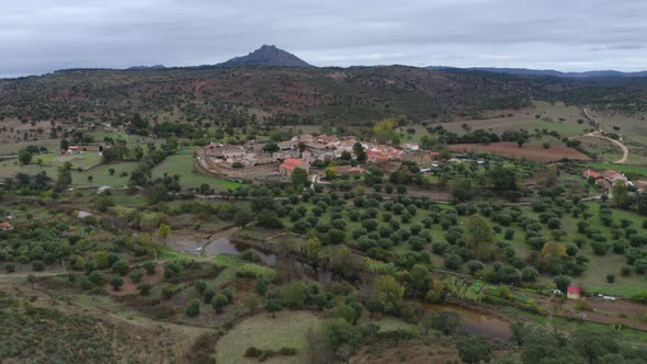 Drone aerial view of Idanha a velha historic village and landscape with Monsanto on the background,