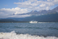 Tour boat cruises in Resurrection Bay near Seward Alaska on a sunny afternoon - PhotoDune Item for Sale