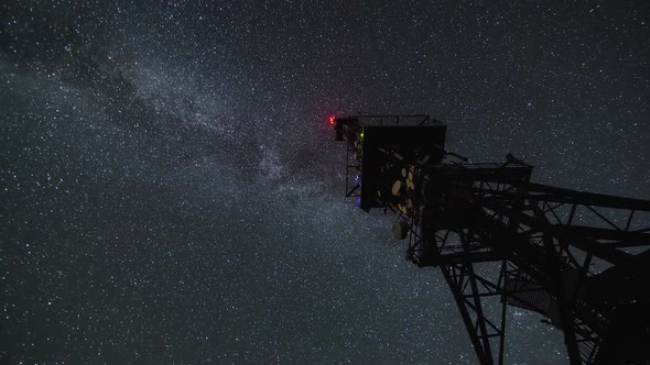 Milky Way Galaxy over Communication Tower in Starry Night