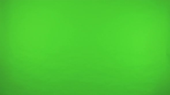 A Asian Woman and a Black Man Lean Into the Shot and Wave at the Camera with a Smile - Green Screen