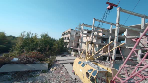 FPV Drone Flies Quickly and Maneuverable Among Abandoned Industrial Buildings and Around an