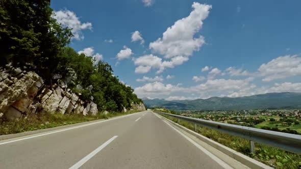 Trip on Countryside Road on Sunny Day