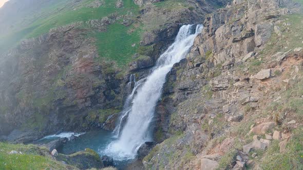 Slowmotion waterfall in a mountain valley in Pyrenees during spring