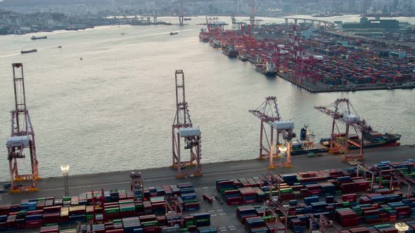 Timelapse Cranes and Ships in Busan Cargo Port in Morning