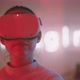 Young woman waving with hands and wearing vr goggles with neon sign in the background - VideoHive Item for Sale