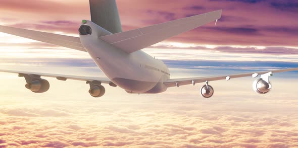 Airplane Flying Above The Clouds