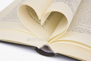 Open book with heart shaped pages. Love for reading