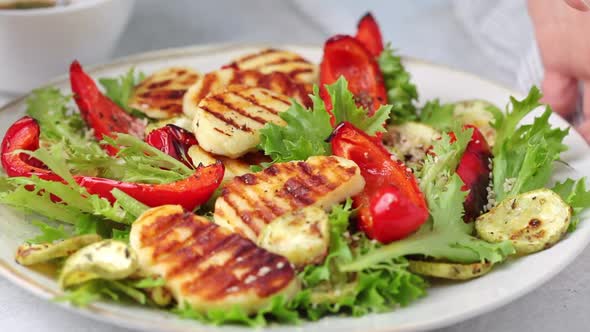 Grilled halloumi salad with baked vegetables