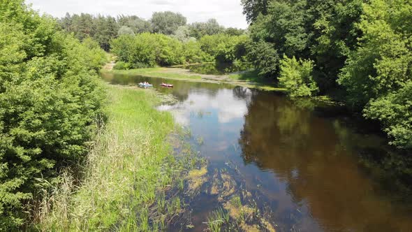 Aerial Drone View of Sport Kayak on Summer Calm Forest River alt