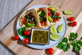 Taco with lime ,tomato and salsa . healthy diet food . - PhotoDune Item for Sale