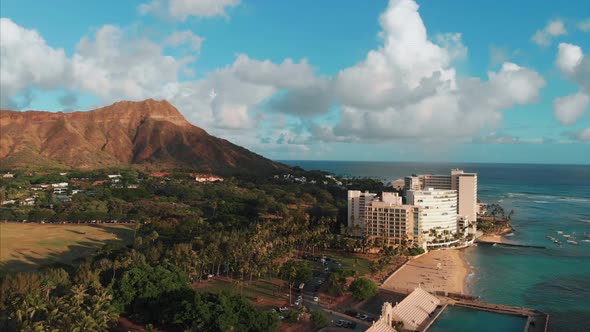 Aerial drone footage of Honolulu, Hawaii. Beautiful real estate, buildings in the city. Palm trees