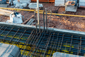 Concrete slab with reinforncing bars in construction site - PhotoDune Item for Sale