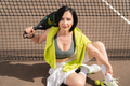 Woman padel player posing on outdoor court - PhotoDune Item for Sale