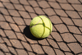 Yellow tennis ball on court - PhotoDune Item for Sale