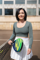 Woman padel player posing on outdoor court - PhotoDune Item for Sale