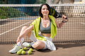 Woman padel player posing on outdoor court - PhotoDune Item for Sale